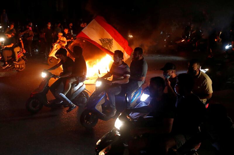 Demonstrators on motorcycles take part in the protests in Beirut. Reuters