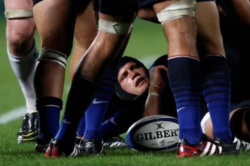 France's Julien Bonnaire is challenged during the rugby test match against Ireland at Chaban-Delmas stadium in Bordeaux August 13, 2011, as part of their preparation for the upcoming 2011 Rugby World Cup in New Zealand.     REUTERS/Jacky Naegelen  (FRANCE - Tags: SPORT RUGBY) *** Local Caption ***  JNA13_RUGBY-_0813_11.JPG