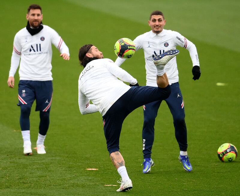 Sergio Ramos trains with Lionel Messi and Marco Verratti. AFP