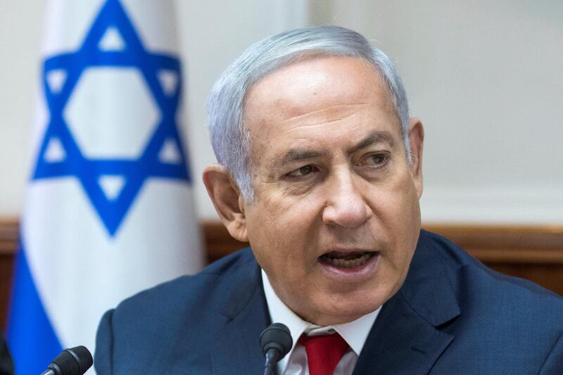 FILE PHOTO: Israeli Prime Minister Benjamin Netanyahu attends the weekly cabinet meeting at his office in Jerusalem August 12, 2018. Jim Hollander /Pool via Reuters/File Photo