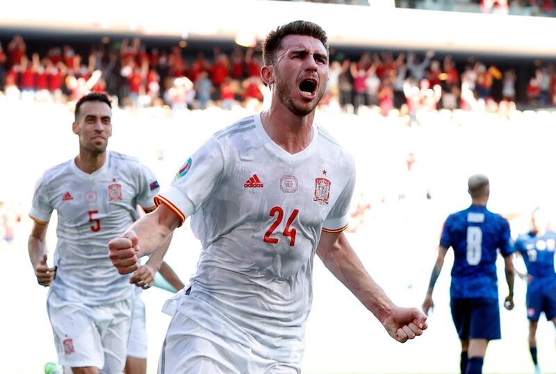 Spain's Aymeric Laporte celebrates scoring their second goal. Reuters