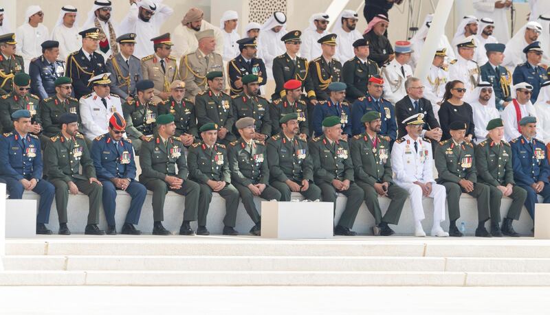 ABU DHABI, UNITED ARAB EMIRATES - November 29, 2018: HH Major General Pilot Sheikh Ahmed bin Tahnoon bin Mohamed Al Nahyan, Chairman of the National and Reserve Service Authority (1st row 3rd R), Rear Admiral Pilot HH Sheikh Saeed bin Hamdan bin Mohamed Al Nahyan, Commander of the UAE Naval Forces (1st row 4th R), HE Brigadier General Saleh Mohamed Saleh Al Ameri, Commander of the UAE Ground Forces (1st row 5th R), members of the UAE Armed Forces and foriegn Armed Forces representatives attend a Commemoration Day ceremony at Wahat Al Karama.

( Hamad Al Kaabi / Ministry of Presidential Affairs )?
---