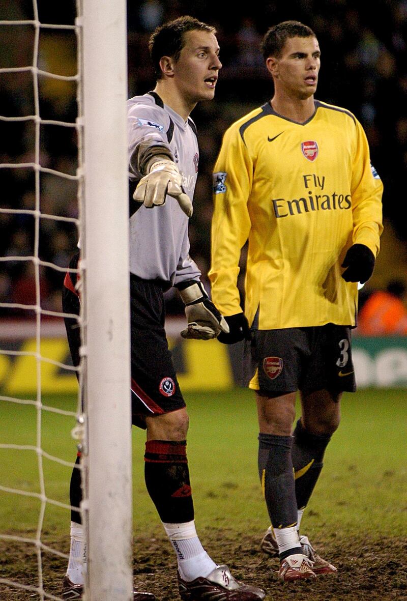 Sheffield United's stand in goal keeper Phil Jagielka markes Arsenal's Jeremie Aliadiere   (Photo by Rui Vieira - PA Images/PA Images via Getty Images)