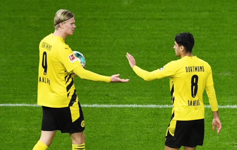 Erling Braut Haaland celebrates scoring their second goal with his teammate Mahmoud Dahoud. AFP