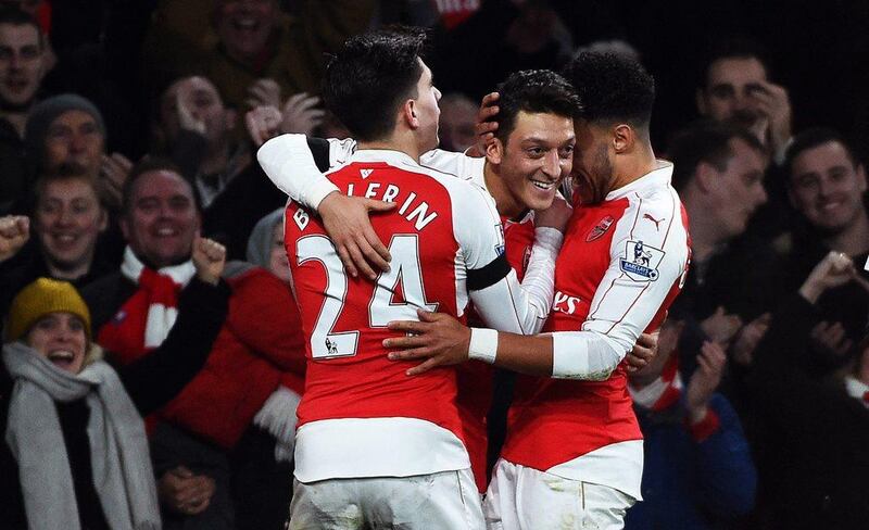 Arsenal enter 2016 as league leaders and are widely fancied to end their 12-year wait for the title. Will Oliver / EPA