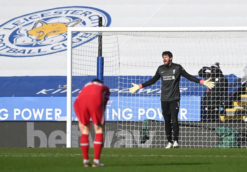 Alisson of Liverpool reacts after conceding a third goal. Getty