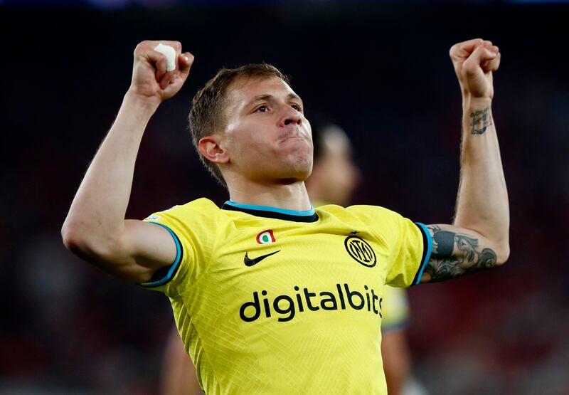 Nicolo Barella celebrates scoring Inter Milan's first goal in their Champions League quarter-final first-leg win over Benfica in Portugal, on April 11, 2023. Reuters