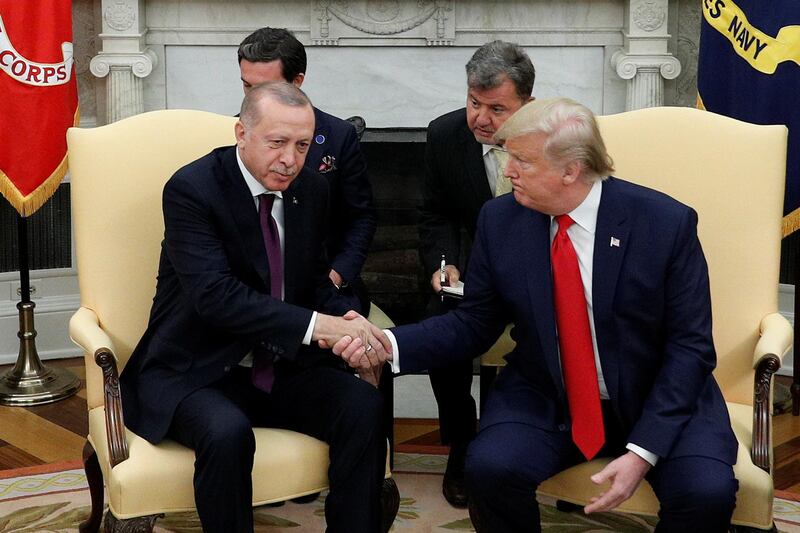 U.S. President Donald Trump meets with Turkey's President Tayyip Erdogan in the Oval Office of the White House in Washington, U.S., November 13, 2019. REUTERS/Tom Brenner?