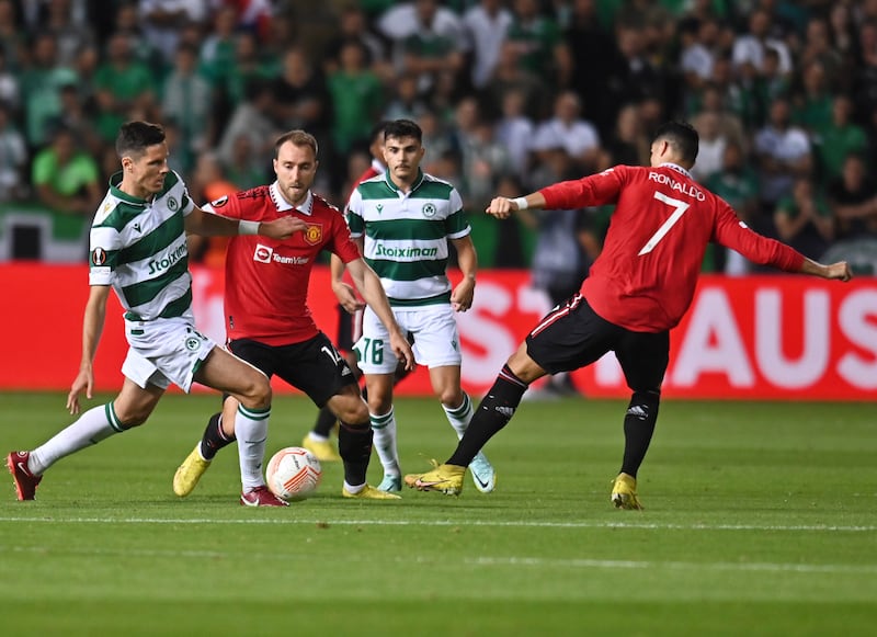 Hector Yuste of Omonia in action against Christian Eriksen. EPA