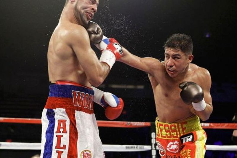 Mexican-American boxer Jessie Vargas, right, thinks he has the inside track when it comes to enticing the Filipino superstar back into the ring. Ring TV