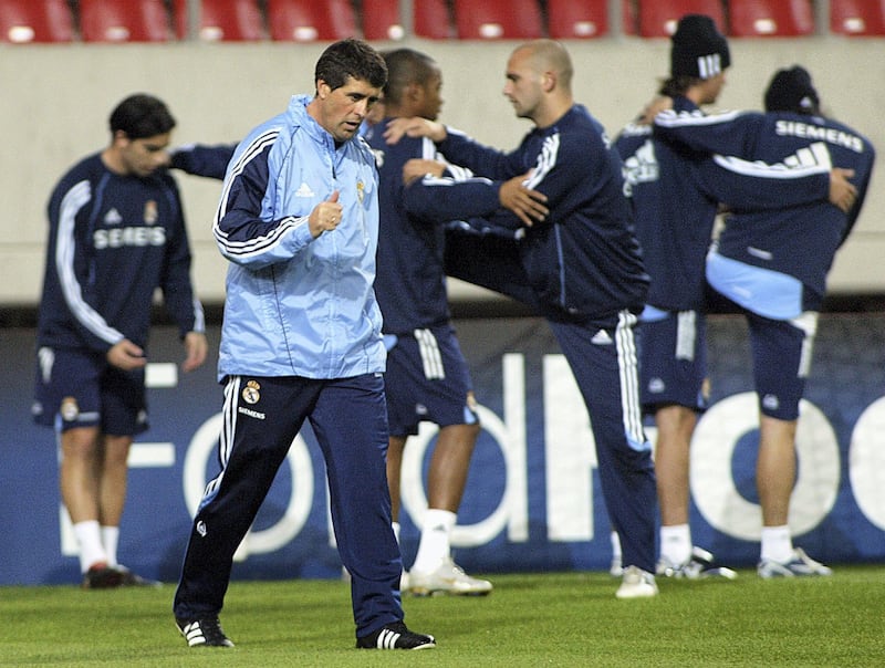 ATHENS, GREECE - DECEMBER 5:  Temporary coach Juan Ramon Lopez Caro directs his players during the Real Madrid training session at the Karaiskaki stadium, December 5, 2005 in Athens, Greece. (Photo by Milos Bicanski/Getty Images) 