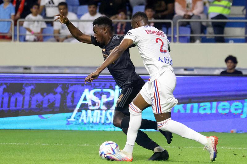 Lyon defender Sinaly Diomande vies for the ball against Arsenal striker Eddie Nketiah. AFP