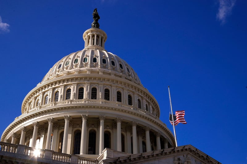 The U.S. Capitol dome is seen during a partial government shutdown in Washington, Monday, Dec. 24, 2018. Both sides in the long-running fight over funding President Donald Trump's U.S.-Mexico border wall appear to have moved toward each other, but a shutdown of one-fourth of the federal government entered Christmas without a clear resolution in sight. (AP Photo/Manuel Balce Ceneta)