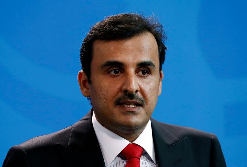 epa06206463 The Emir of Qatar, Sheikh Tamim bin Hamad Al Thani, speaks during a joint press conference with German Chancellor Angela Merkel (unseen) after their meeting in the Chancellery, Berlin, Germany, 15 September 2017. Al Thani and Merkel reportedly discussed the political situation of Qatar in the region.  EPA/FELIPE TRUEBA