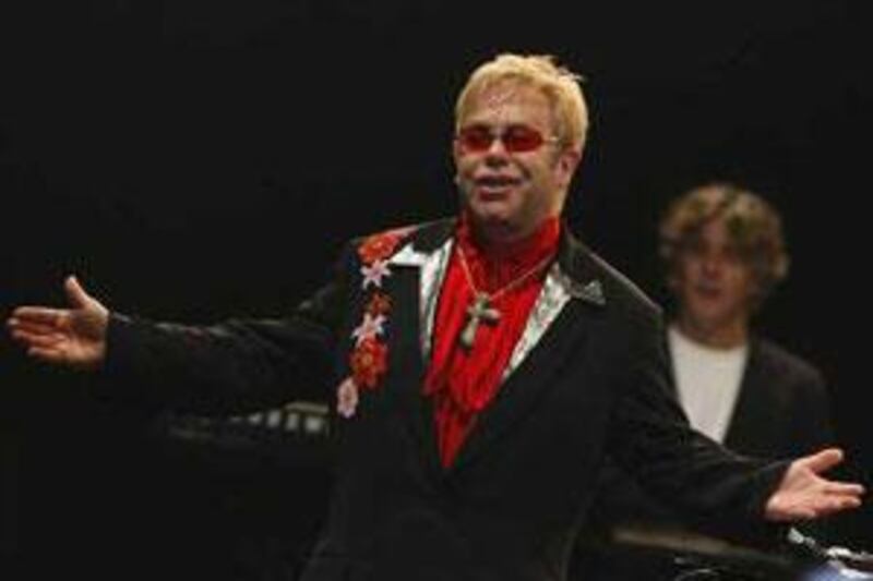 Elton John, seen here performing at Emirates Palce, in Abu Dhabi, in January 2009, has come out in support of proposed legislation in the UK that would target individual file sharers.