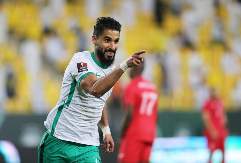 Saleh Al-Shehri celebrates scoring Saudi Arabia's third goal against Palestine. Reuters