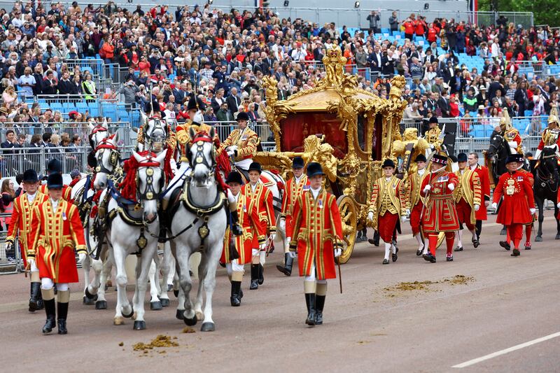The Gold State Coach passes Buckingham Palace during the Platinum Jubilee Pageant in June 2022. PA