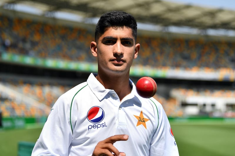 Pakistan's 16-year-old paceman Naseem Shah tosses the ball during a training session at Gabba in Brisbane on November 20, 2019, ahead of the first cricket Test match against Australia. -- IMAGE RESTRICTED TO EDITORIAL USE - STRICTLY NO COMMERCIAL USE --
 / AFP / AFP  / Saeed KHAN / -- IMAGE RESTRICTED TO EDITORIAL USE - STRICTLY NO COMMERCIAL USE --
