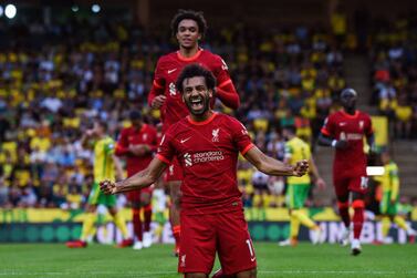 NORWICH, ENGLAND - AUGUST 14: (OUT, THE SUN ON SUNDAY OUT) Mohamed Salah of Liverpool celebrates after scoring the third goal during the Premier League match between Norwich City  and  Liverpool at Carrow Road on August 14, 2021 in Norwich, England. (Photo by John Powell / Liverpool FC via Getty Images)