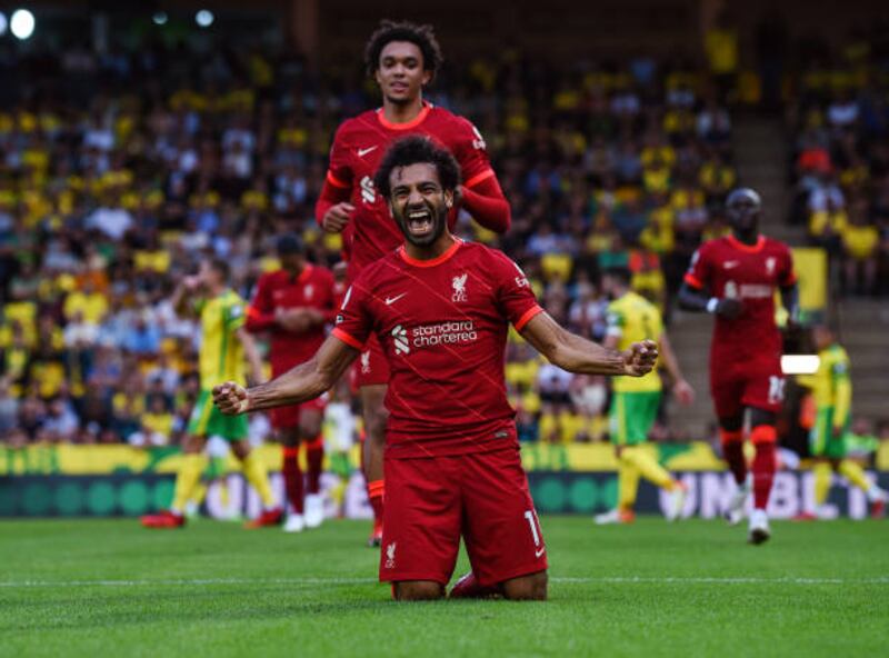 NORWICH, ENGLAND - AUGUST 14: (OUT, THE SUN ON SUNDAY OUT) Mohamed Salah of Liverpool celebrates after scoring the third goal during the Premier League match between Norwich City  and  Liverpool at Carrow Road on August 14, 2021 in Norwich, England. (Photo by John Powell / Liverpool FC via Getty Images)