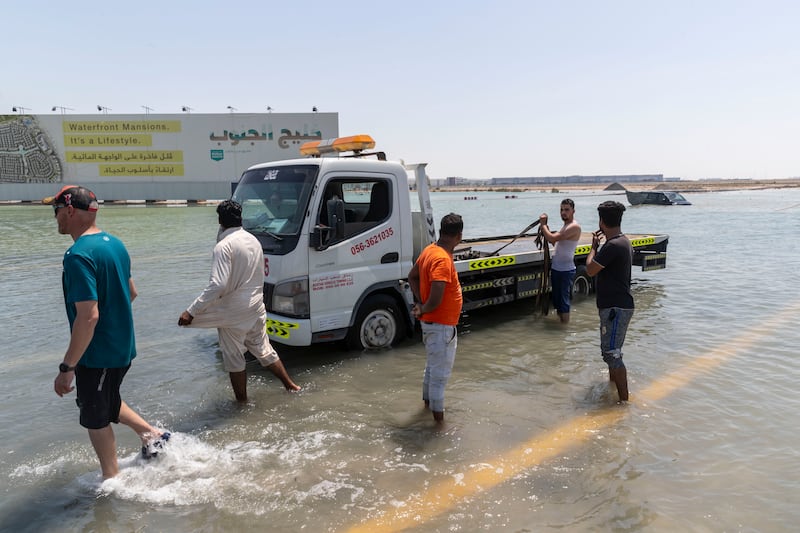 Vehicles being recovered near Al Maktoum airport in Dubai.
Antonie Robertson / The National