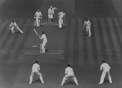 15th August 1955:  English cricketer Denis Compton lofts a ball from Heine (SA) to log for two runs at the start of the second day's play in the final Test Match against South Africa at the Oval in London.  (Photo by Dennis Oulds/Central Press/Getty Images)