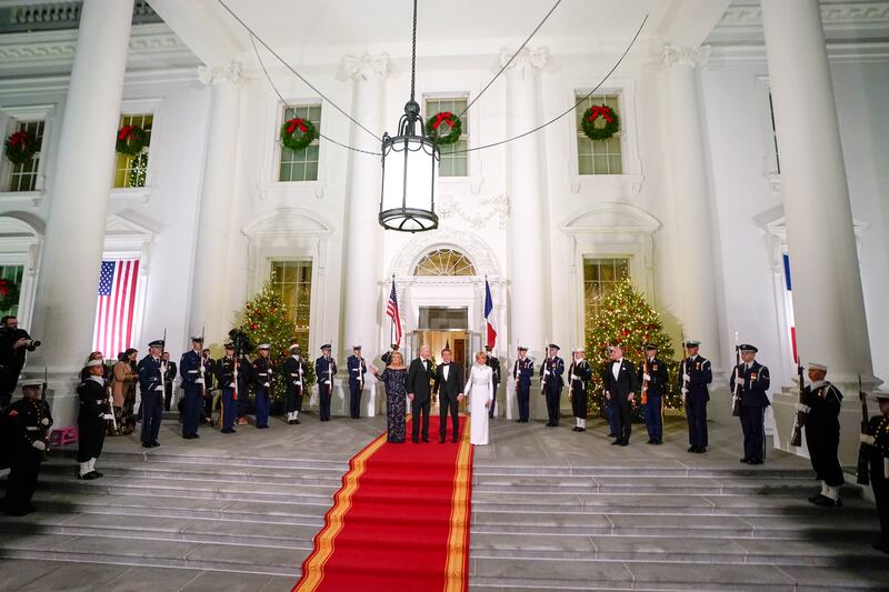 The couples pose for a photo at the North Portico of the White House. EPA