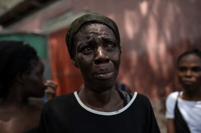 A woman speaks about being sexually assaulted by gang members in Port-au-Prince. AP