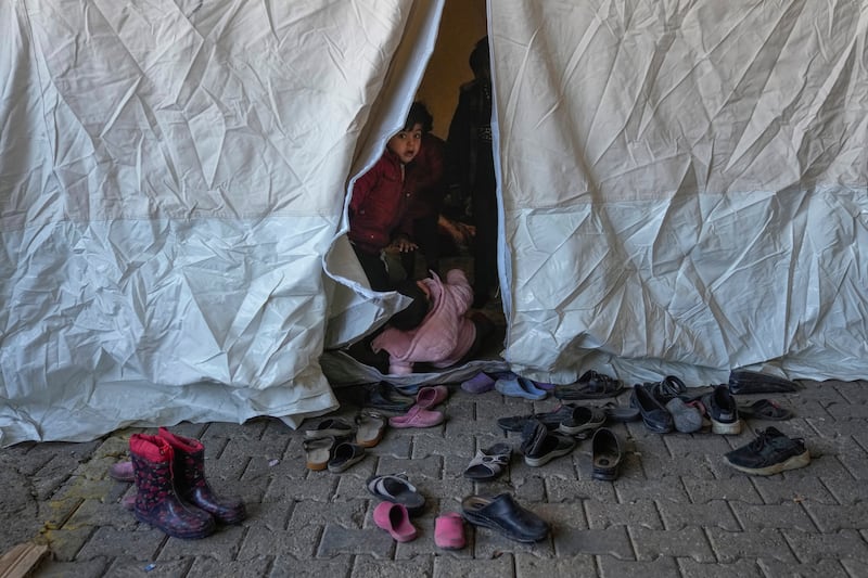 A Syrian child in a tent in the Islahiye district. AP