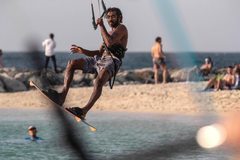 DUBAI, UNITED ARAB EMIRATES. 12 OCTOBER 2020. UAE kitesurfing champion Mohammed Al Mansoori. Mohammed got into the sport after falling in a coma from a biking accident which also broke both his legs and meant that he couldn't walk for years. As the captain of the UAE kitesurfing club, he calls
for more Emiratis to join the sport so it could grow in the region and they could have a GCC league. (Photo: Antonie Robertson/The National) Journalist: Haneed Dajani. Section: National.
