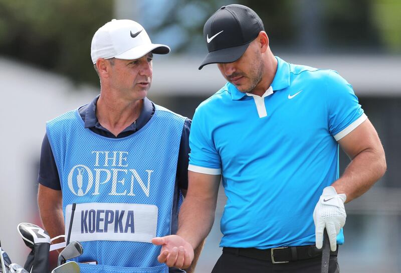 USA's Brooks Koepka (right) with caddy Ricky Elliott during preview day three of The Open Championship 2019 at Royal Portrush Golf Club. PRESS ASSOCIATION Photo. Picture date: Tuesday July 16, 2019. See PA story GOLF Open. Photo credit should read: Richard Sellers/PA Wire. RESTRICTIONS: Editorial use only. No commercial use. Still image use only. The Open Championship logo and clear link to The Open website (TheOpen.com) to be included on website publishing.