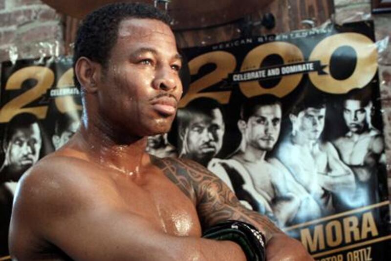 Sugar Shane Mosley poses for media at a gym in the Hollywood district of Los Angeles on Wednesday, Sept. 1, 2010. Mosley is scheduled to face Sergio Mora in a junior middleweight boxing bout Sept. 18 in Los Angeles. (AP Photo/Reed Saxon)