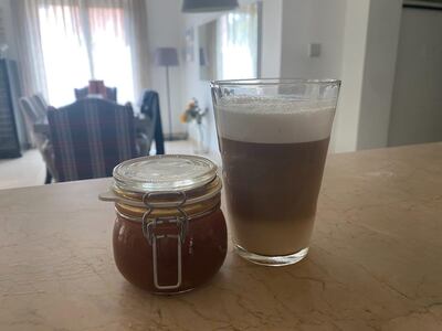 The finished product, pumpkin-spiced syrup (left) and a DIY pumpkin-spiced latte, made at home. Farah Andrews / The National 