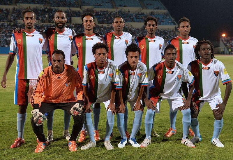 Eritrea national football team players line up for a team photo just before the start of their World Cup qualifier on Tuesday against Botswana. Monirul Bhuiyan / AFP / October 13, 2015