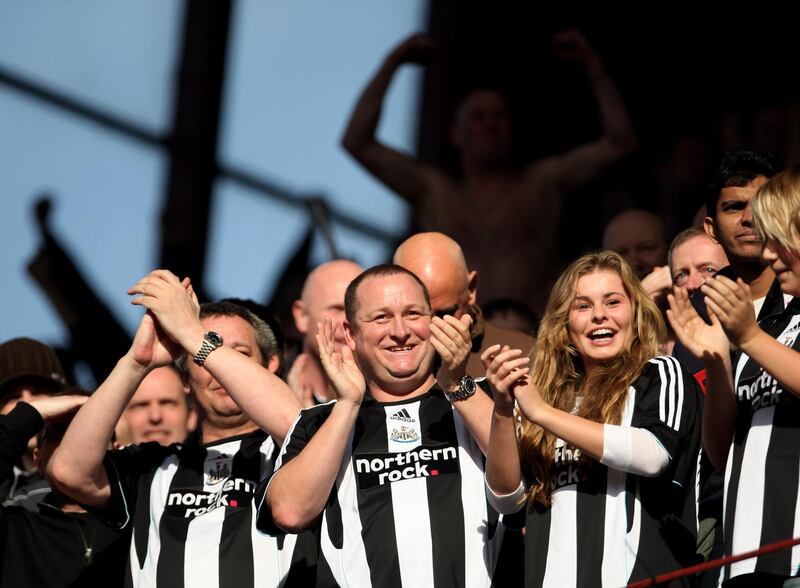 Mike Ashley celebrates a Newcastle goal against Aston Villa in the away end at Villa Park on February 9, 2008.