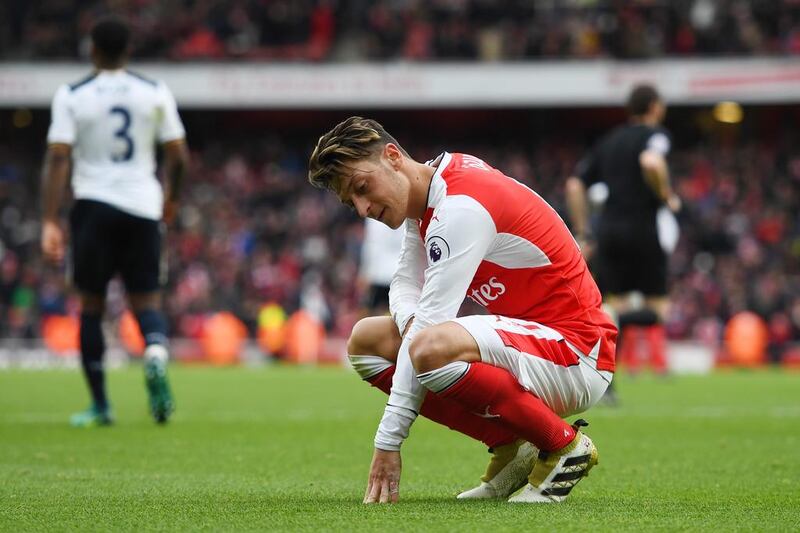 Mesut Ozil of Arsenal reacts. Shaun Botterill / Getty Images