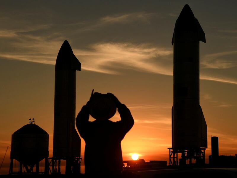 SpaceX starships SN9(L) and SN10 continue to wait for test flights as the sun sets at the launch facilities in Boca Chica, Texas. Reuters