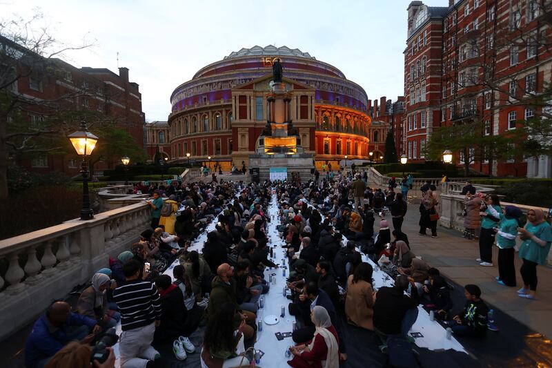 Muslims break their Ramadan fast at an open iftar outside the Royal Albert Hall in London. Reuters