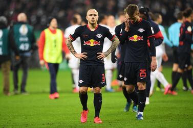 RB Leipzig players Angelino, left, and Dani Olmo after their German Cup defeat to Eintracht Frankfurt on Tuesday. Getty