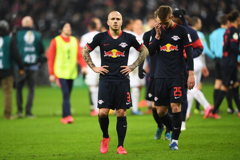 FRANKFURT AM MAIN, GERMANY - FEBRUARY 04: Angelino and Dani Olmo of RB Leipzig react to defeat after the DFB Cup round of sixteen match between Eintracht Frankfurt and RB Leipzig at Commerzbank Arena on February 04, 2020 in Frankfurt am Main, Germany. (Photo by Matthias Hangst/Bongarts/Getty Images)