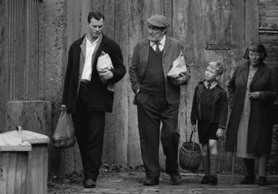 Actors, from left, Jamie Dornan, Ciaran Hinds, Jude Hill and Judi Dench in 'Belfast'. AP