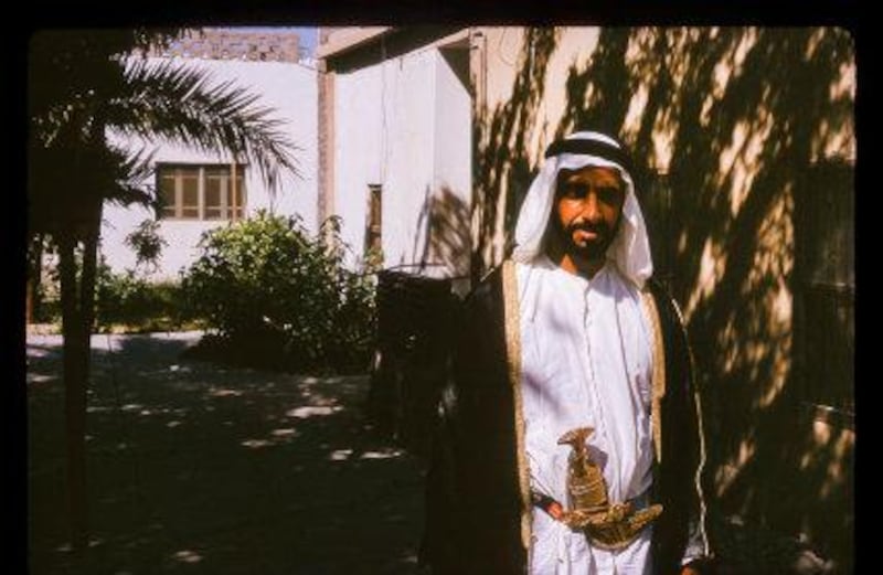 Sheikh Zayed at Qasr Al Hosn in the shade of palm trees, 1966. All photos: Nick Cochrane-Dyet
