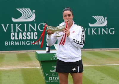 BIRMINGHAM, ENGLAND - JUNE 20: Ons Jabeur of Tunisia celebrates with the trophy after her victory against Daria Kasatkina of Russia in the Womens Singles Final during the Viking Classic Birmingham at Edgbaston Priory Club on June 20, 2021 in Birmingham, England. (Photo by Barrington Coombs/Getty Images for LTA)
