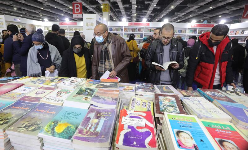 People visiting the 2022 Cairo International Book Fair at the International Exhibition. EPA