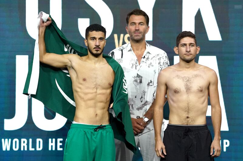 Ziyad Al Maayouf, leftt, and Jose Alatorre with Matchroom promoter Eddie Hearn during the weigh in at the King Abdullah Sport City Stadium in Jeddah, Saudi Arabia on Friday August 19, 2022. PA