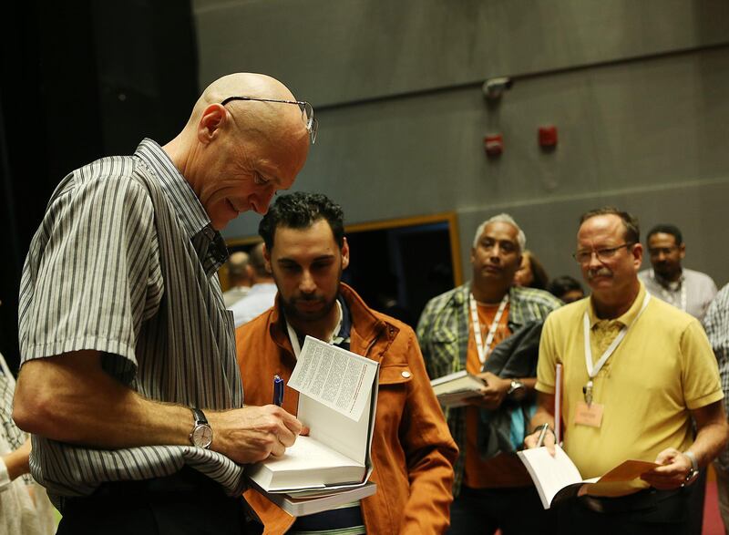 Abu Dhabi, 06 February, 2017:  Andrew Hallam  author of Millionaire Teacher  Signs Autographs  during the session at the Cranleigh School in Abu Dhabi . ( Satish Kumar / The National )  
ID No: 85524
Section: Business
Reporter: Suzanne Locke *** Local Caption ***  SK-AndrewHallam-06022017-06 .jpg