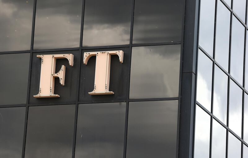 LONDON, ENGLAND - JULY 23:  The Financial Times logo sits on display outside the headquarters of the newspaper on July 23, 2015 in London, England. Japanese media company Nikkei have reached an agreement to buy the Financial Times Group from publishing group Pearson for Â£844m. The Financial Times is a British, English language newspaper launched in 1888 and has a combined print and online readership of 720,000.  It is part of the FT group which also includes a 50% stake in The Economist and Russian newspaper Vedemosti.  (Photo by Danny E. Martindale/Getty Images)