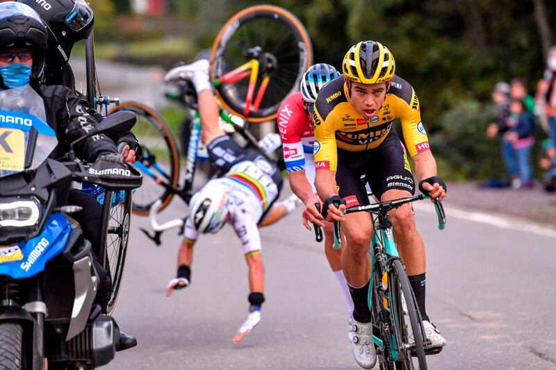 French rider Julian Alaphilippe falls after crashing into a motorbike during the Tour of Flanders on Sunday, October 18. AFP