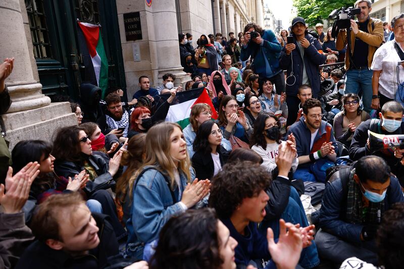 Pro-Palestinian students gather outside the university. EPA