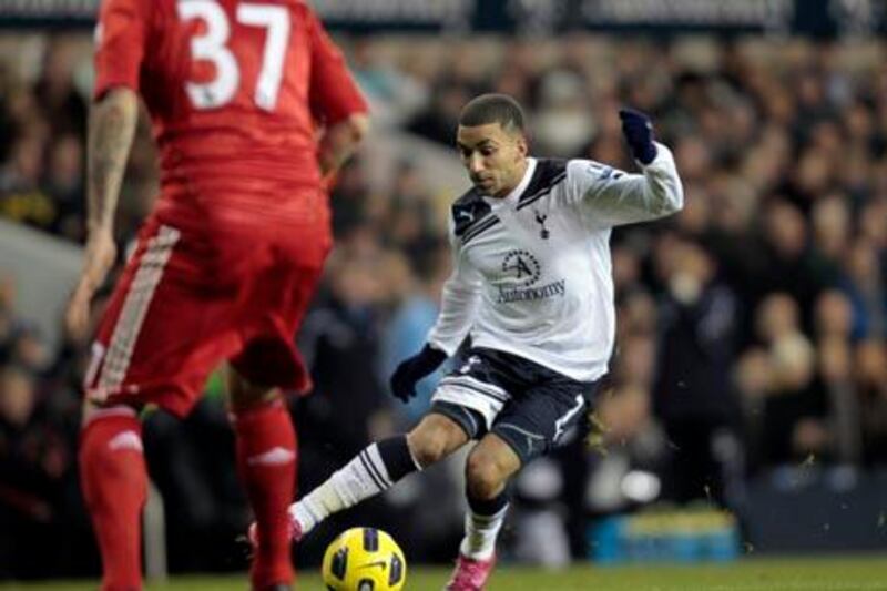 Tottenham Hotspur's Aaron Lennon, controis the bal in front of Liverpool's Martin Skrtel, during their English Premier League soccer match at the White Hart Lane ground in London, Sunday, Nov. 28, 2010.  Tottenham won the match 2-1. (AP Photo/Lefteris Pitarakis)  NO INTERNET/MOBILE USAGE WITHOUT FOOTBALL ASSOCIATION PREMIER LEAGUE (FAPL) LICENCE - CALL +44 (0)20 7864 9121 or EMAIL info@football-dataco.com FOR DETAILS 